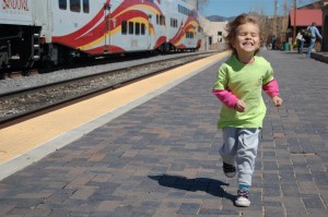 Piper running toward the train